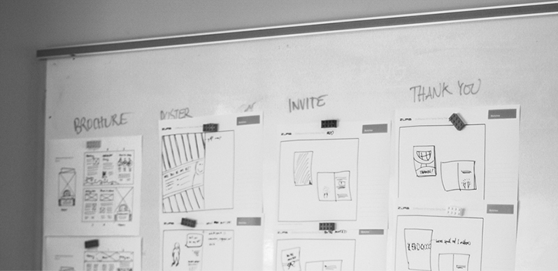 whiteboard with wireframe sketches